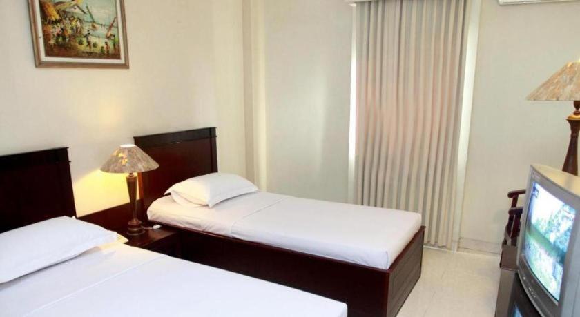 ฮอริสัน พลาซ่า เตกัล Hotel ภายนอก รูปภาพ